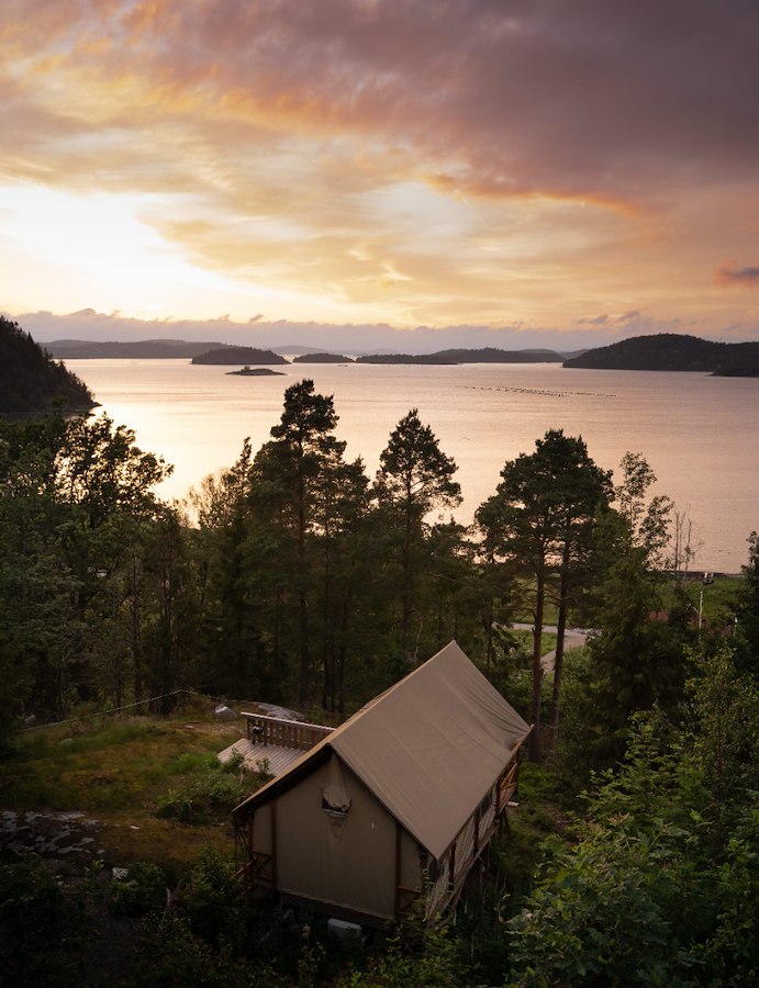 Glamping tent on granite cliff