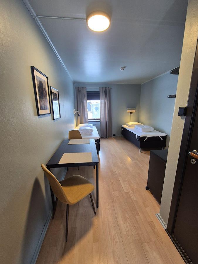 Twin room with kitchenette and bathroom