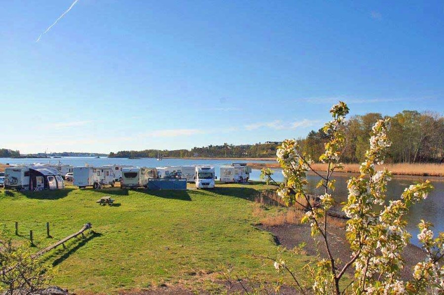 By the cafe; motorhome pitches near the sea and close to all facilities