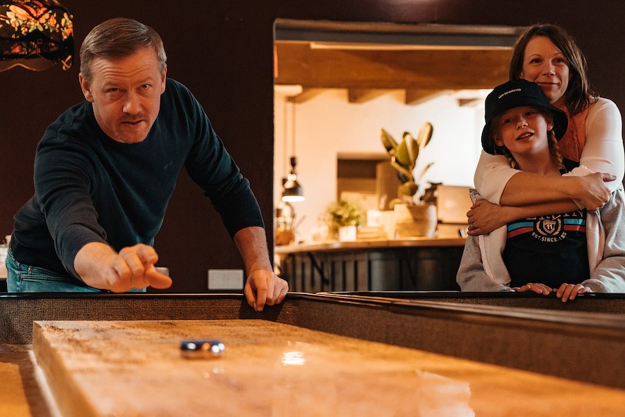 Spela Shuffleboard 